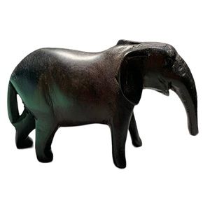 Small hand carved wood elephant figurine